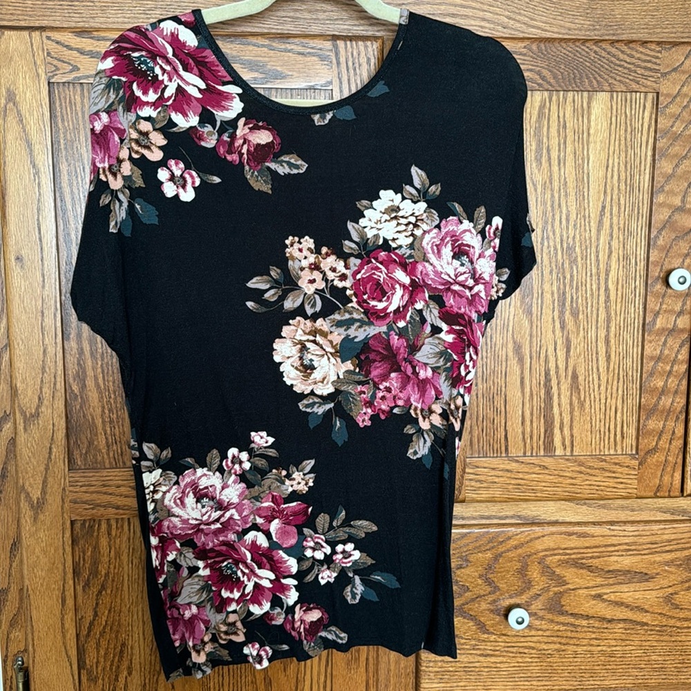 Gently used, dog friendly open back top